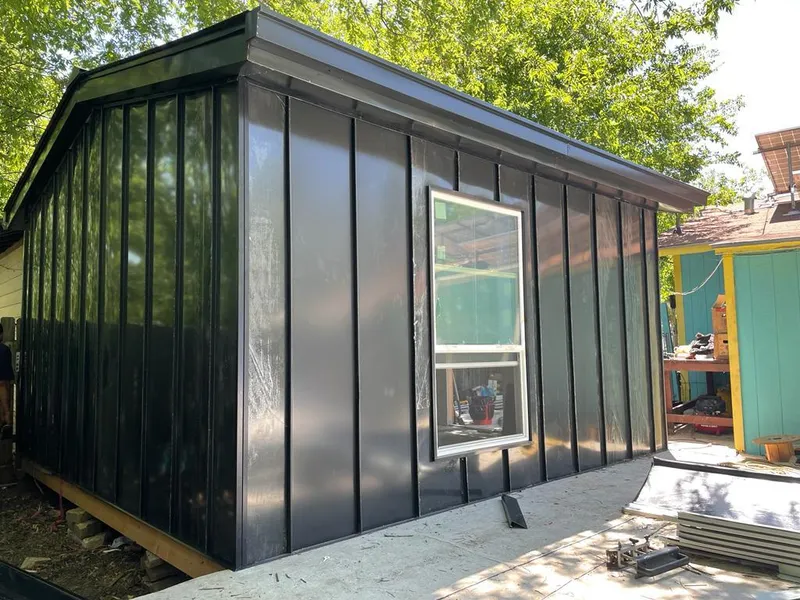 Black standing seam metal wall panels for Metal Roof Installation in Englewood